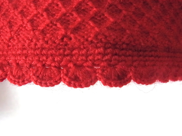 アンティーク赤いセーターの裾